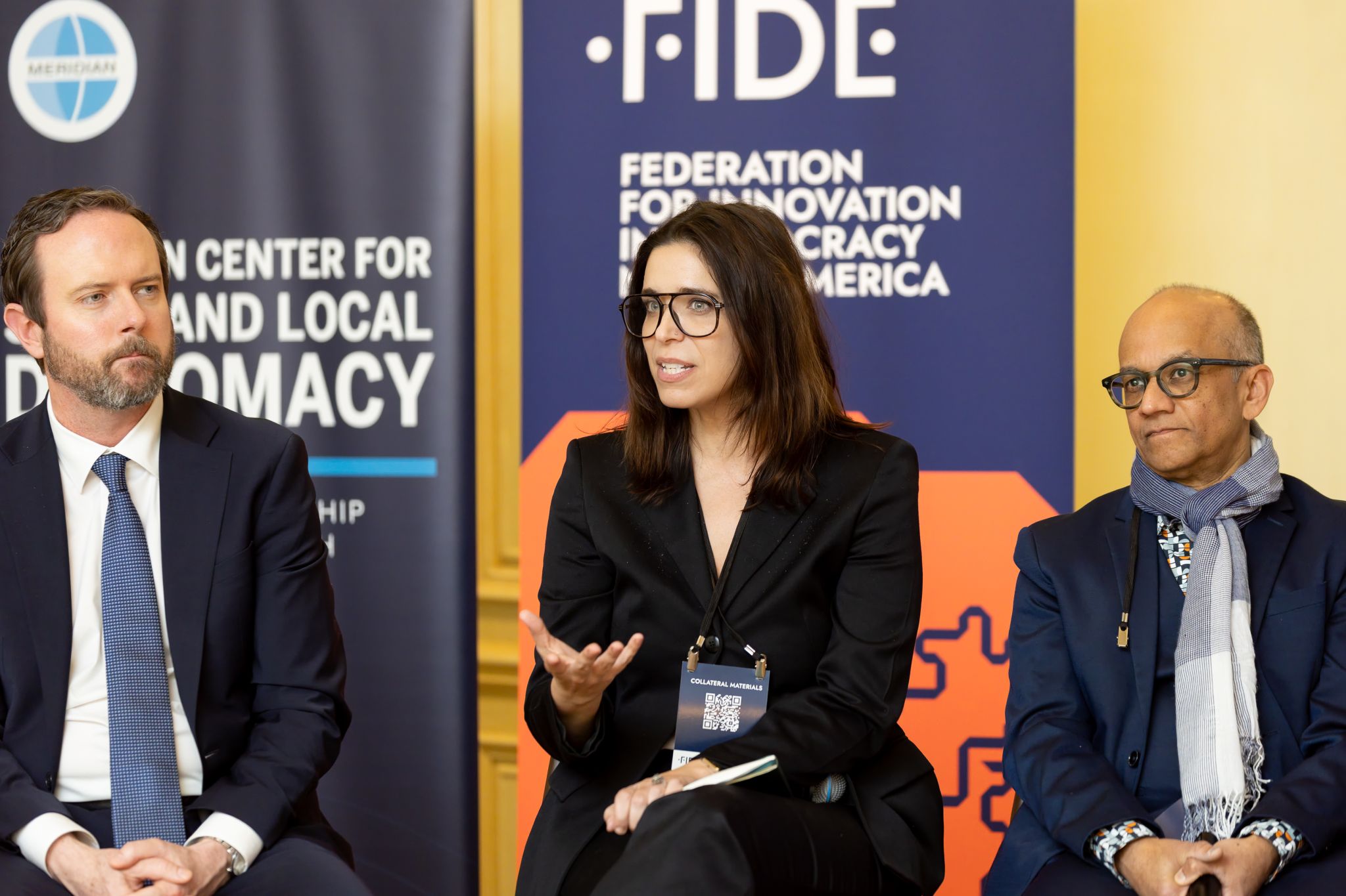 Amy Lee speaking at a panel 
