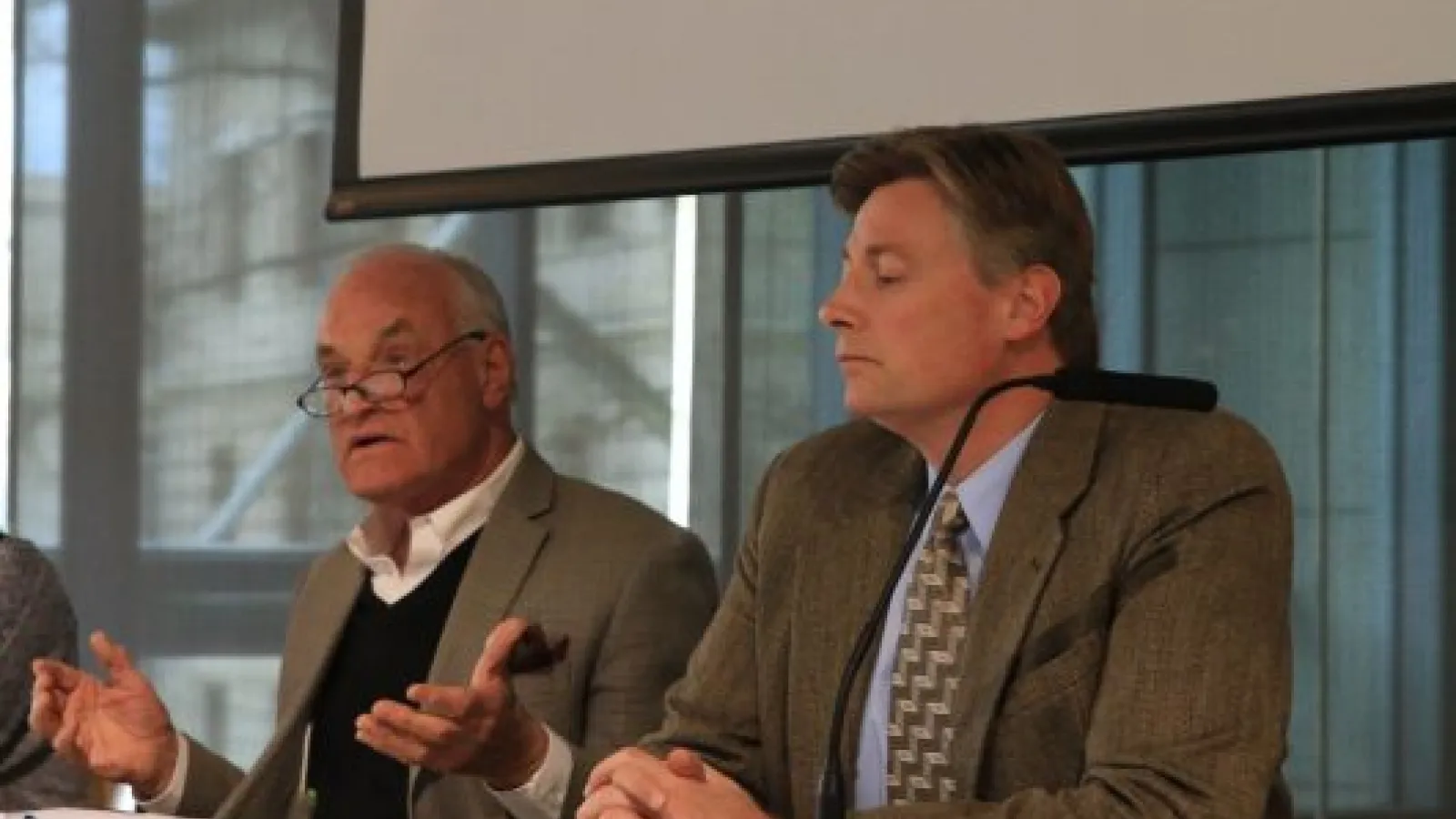 Ex-members of Congress Barry Goldwater Jr. and Jason Altmire sitting on a panel together