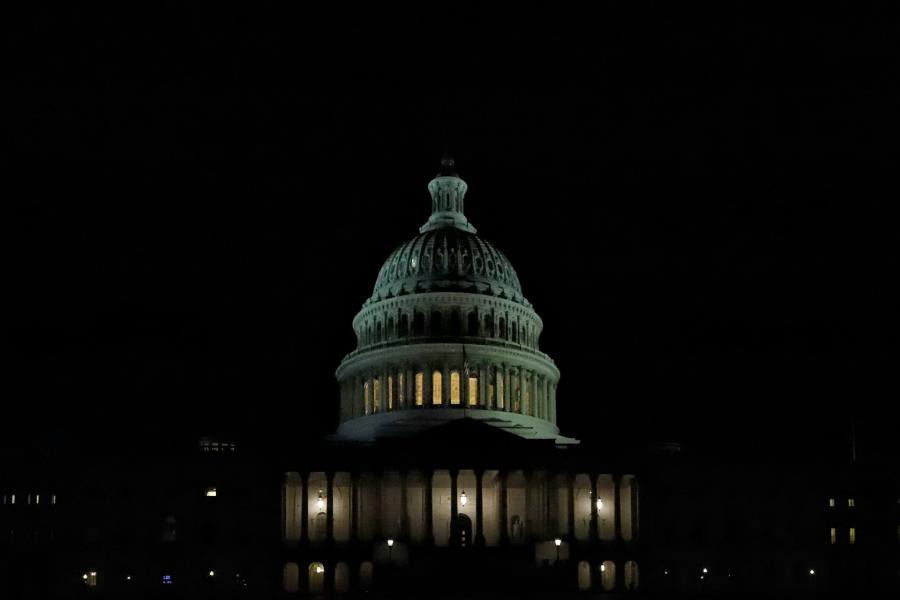 The US capitol building at night